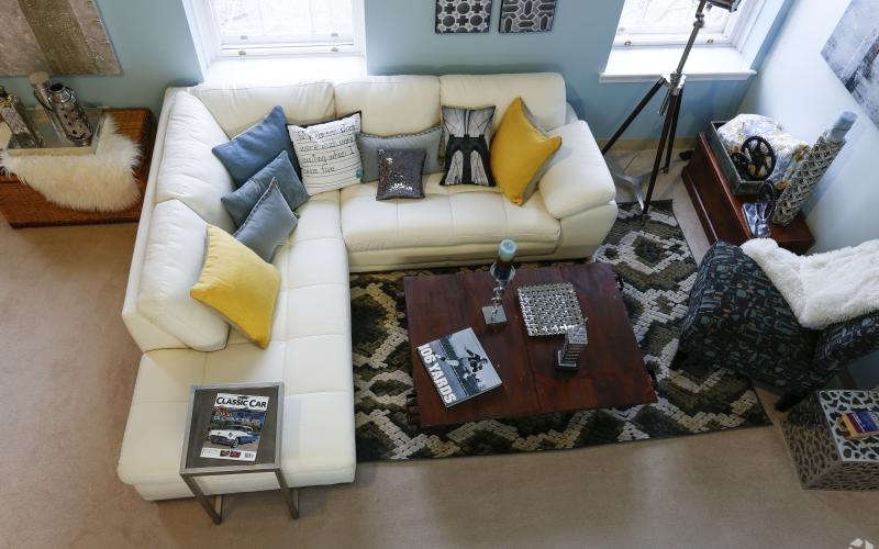a living room with a couch and coffee table